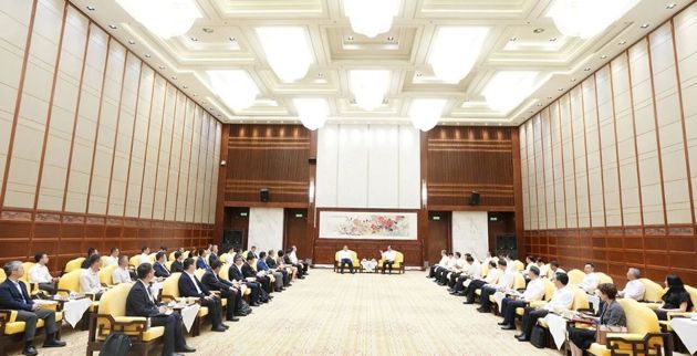 省政府与上海国投公司举行工作会谈 毛伟明袁国华出席